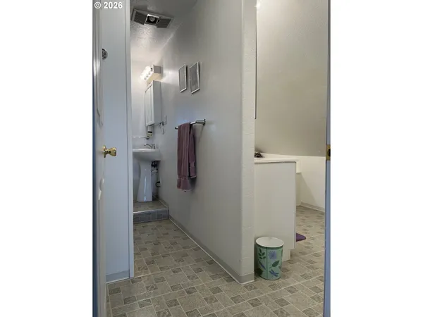 a bathroom with a sink and a toilet