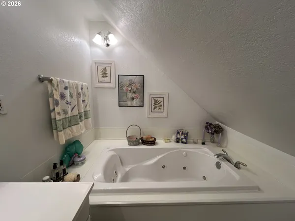 a bathroom with a sink and a bathtub