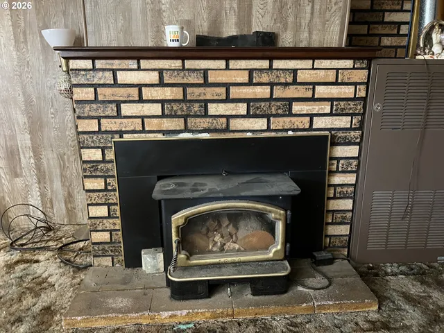 a bed room with a bed furniture and a window