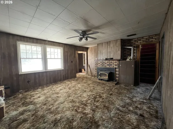 a view of an entryway with fireplace