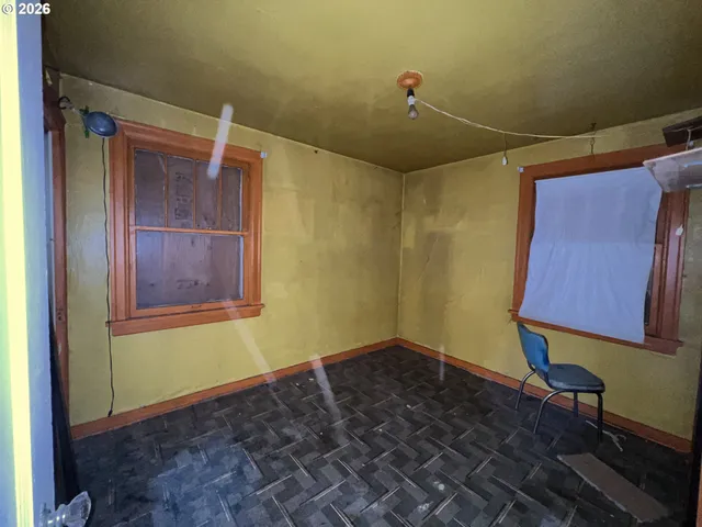 a kitchen with a sink and a refrigerator