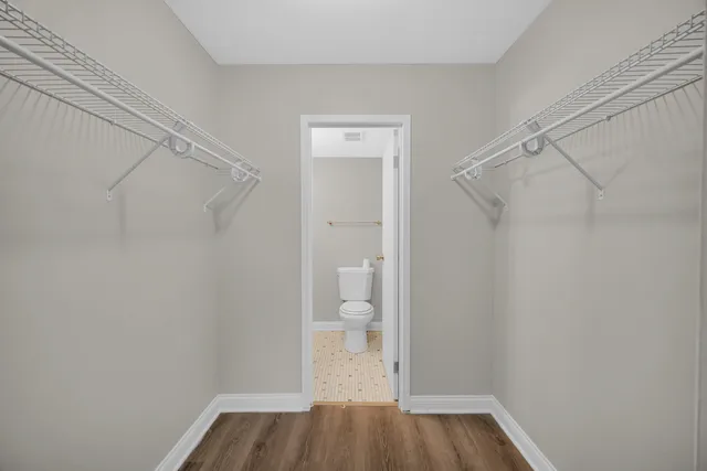 a view of bathroom with a wooden floor