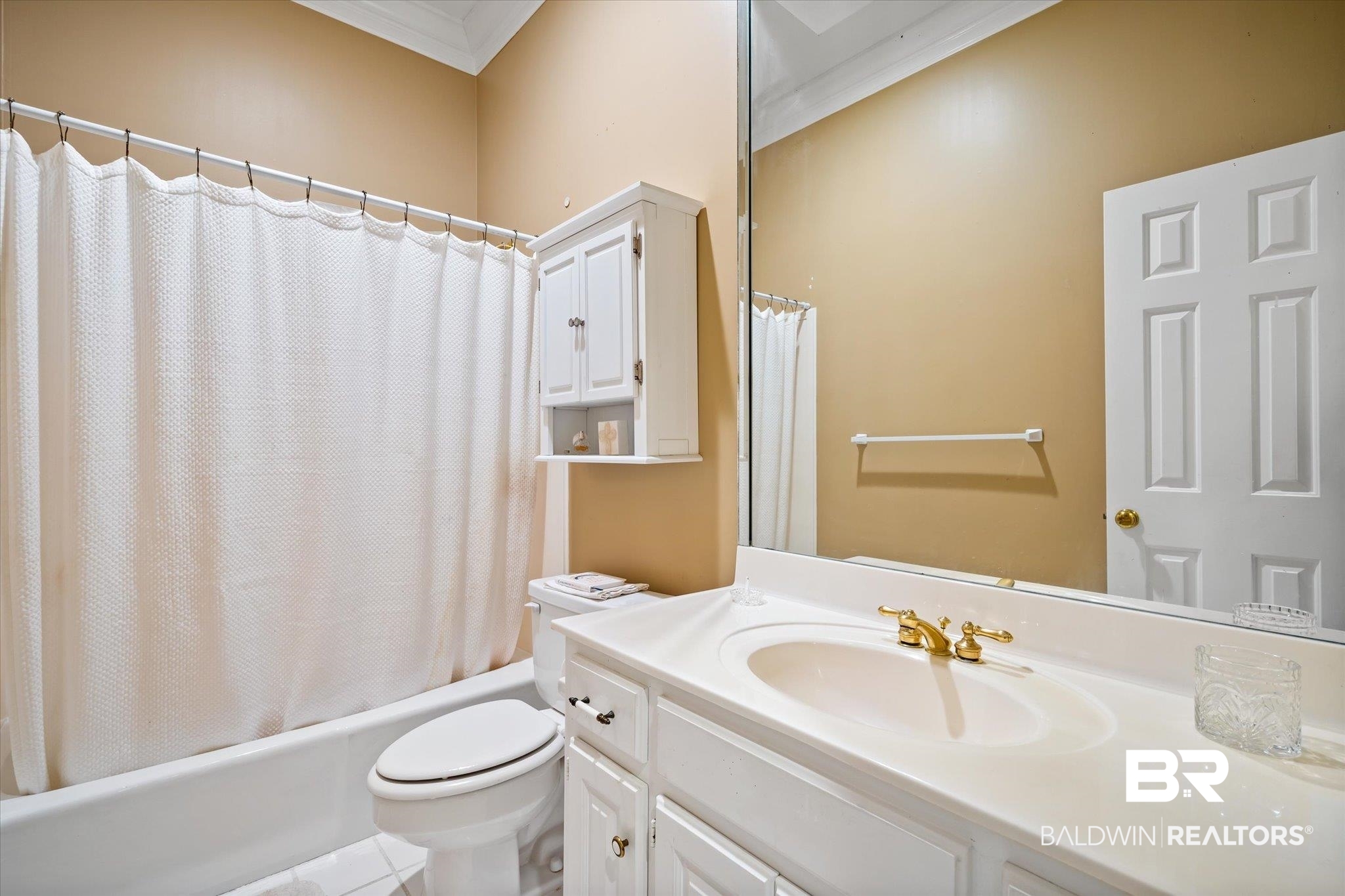 4930 River Trace Theodore, AL 36582 - Photo 31 of 57 Full bathroom with shower / bathtub combination with curtain, toilet, ornamental molding, vanity, and tile patterned flooring