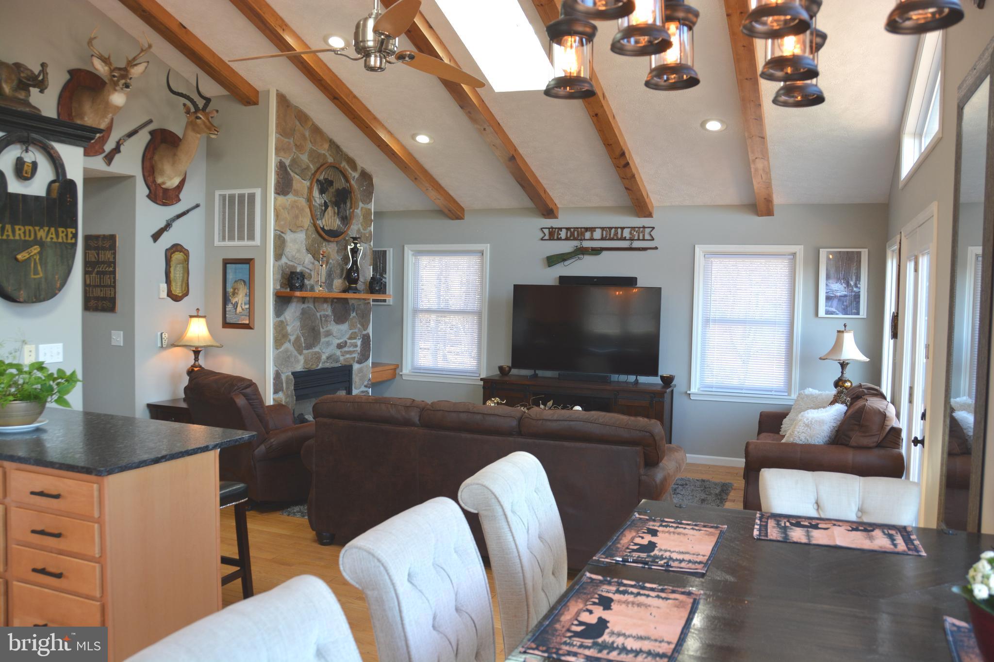 400 Locust Ridge Moorefield, WV 26836 - Photo 24 of 87 a living room with furniture and a flat screen tv