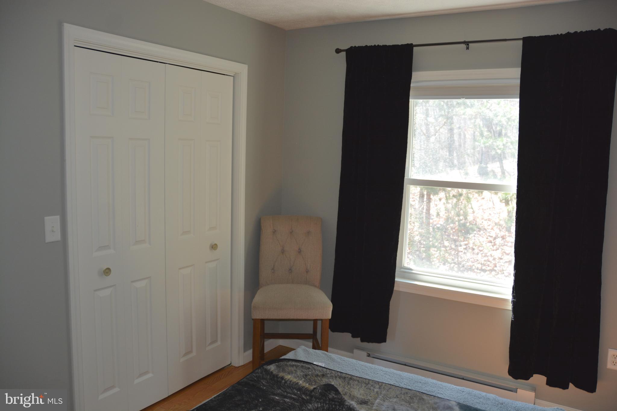 400 Locust Ridge Moorefield, WV 26836 - Photo 35 of 87 a view of a bedroom with a window