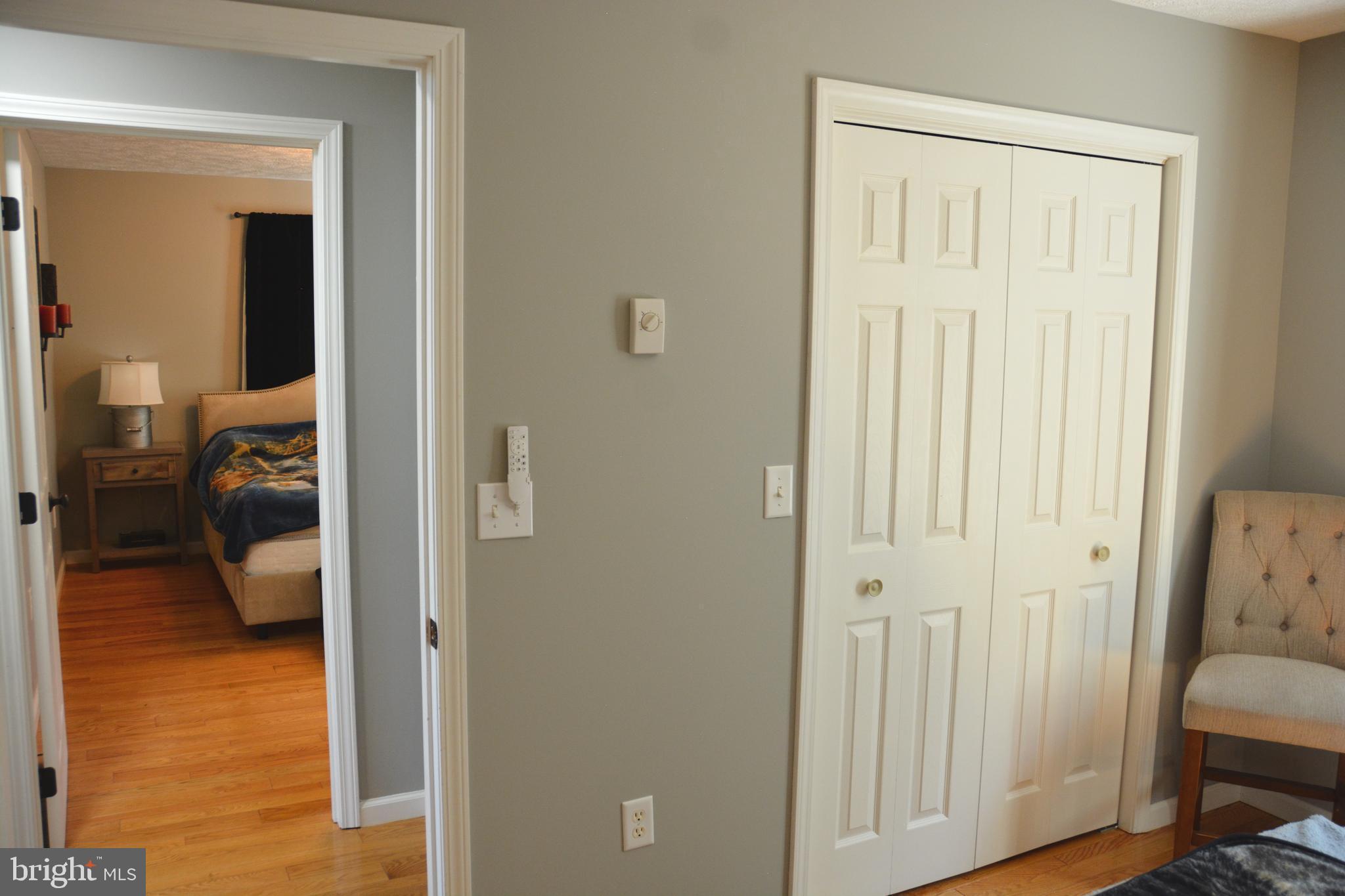 400 Locust Ridge Moorefield, WV 26836 - Photo 37 of 87 a en suite bathroom with a sink and a view of bedroom