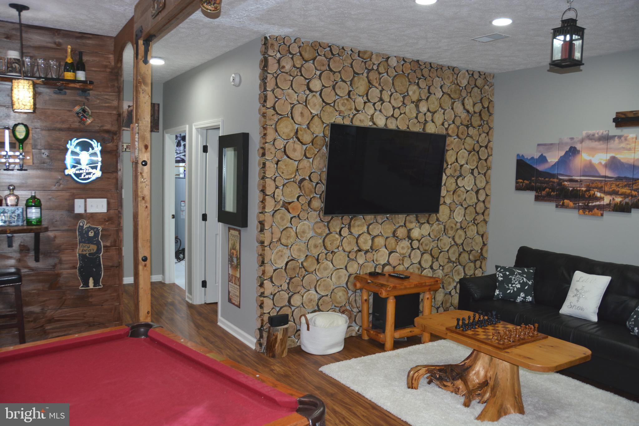 400 Locust Ridge Moorefield, WV 26836 - Photo 44 of 87 a living room with furniture and a fireplace