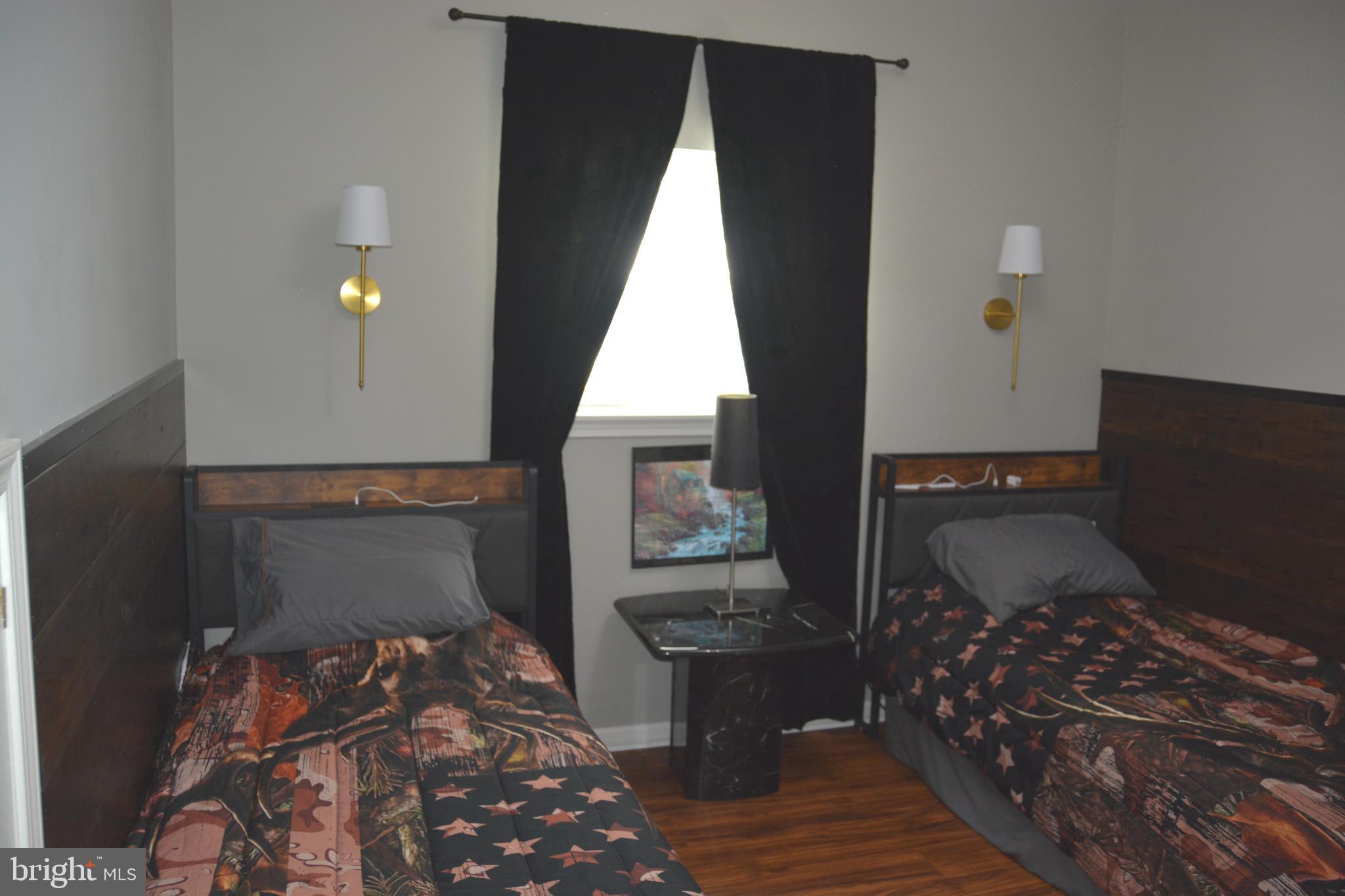 400 Locust Ridge Moorefield, WV 26836 - Photo 56 of 87 a bedroom with bed and window