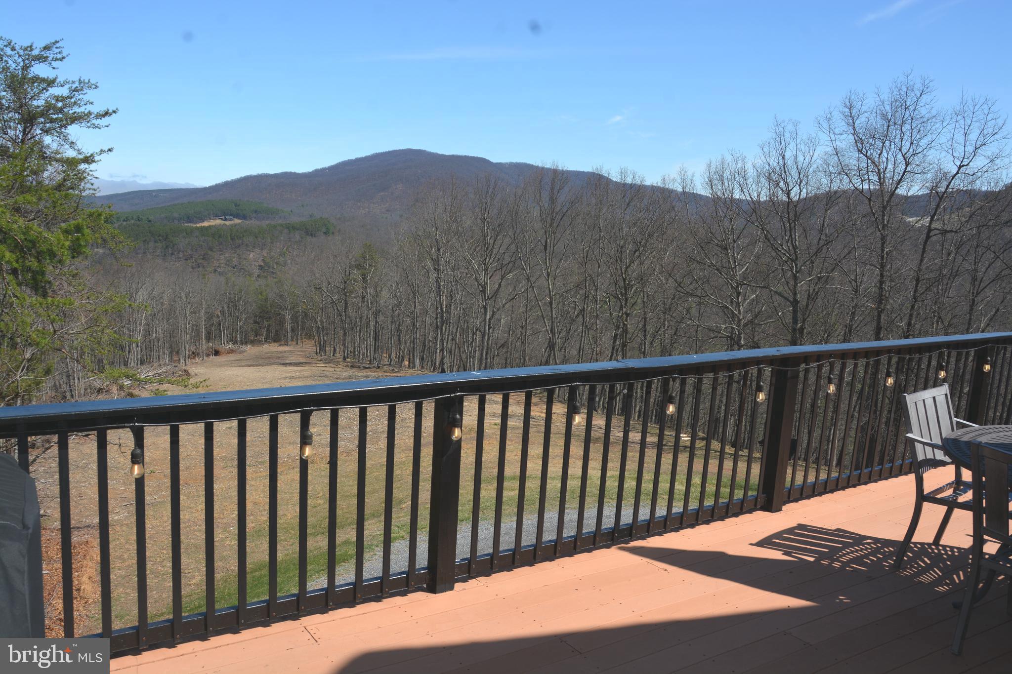 400 Locust Ridge Moorefield, WV 26836 - Photo 63 of 87 a view of a balcony with wooden fence and floor
