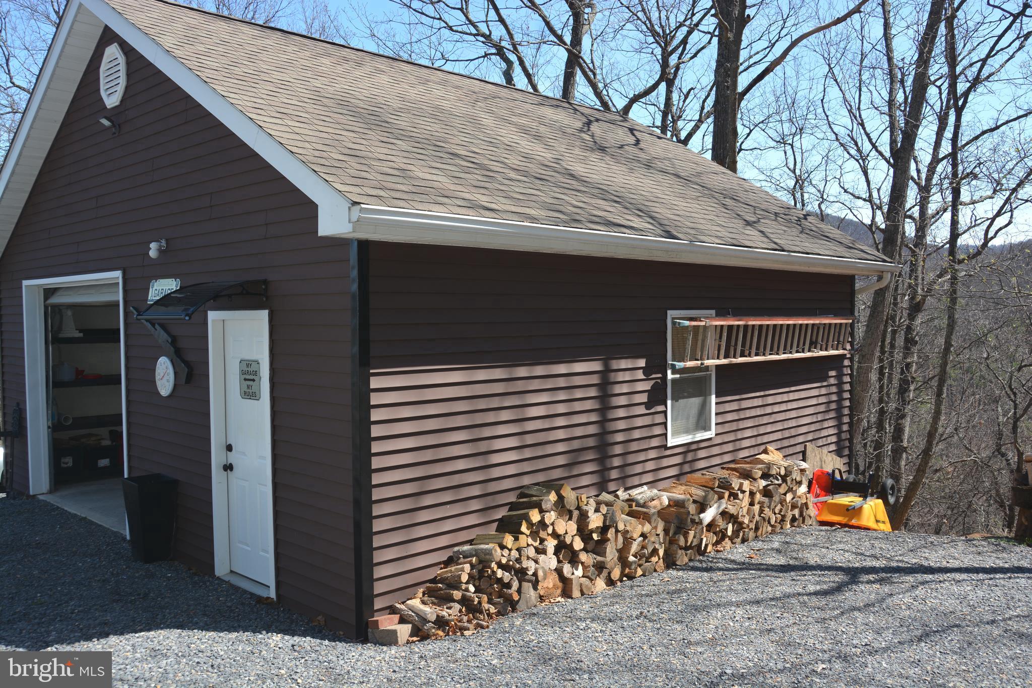 400 Locust Ridge Moorefield, WV 26836 - Photo 67 of 87 a view of house with outdoor space and seating area