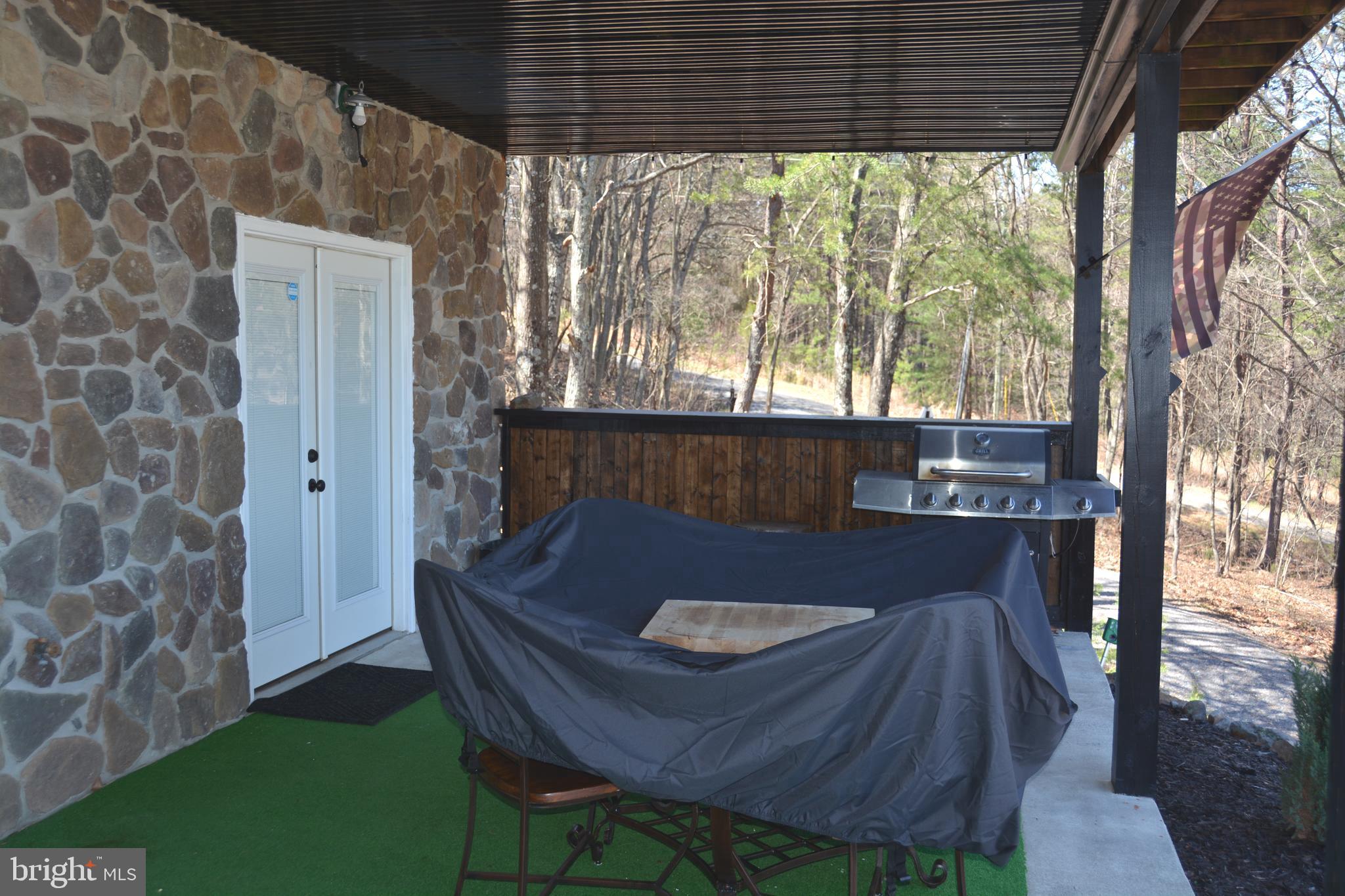 400 Locust Ridge Moorefield, WV 26836 - Photo 82 of 87 a wooden table sitting in backyard of a house