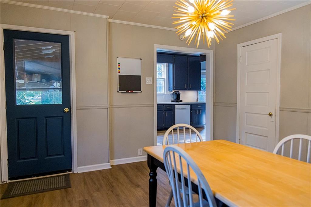 27 Oak Street Northeast Rome, GA 30161 - Photo 12 of 27 a dining room with a table and chairs