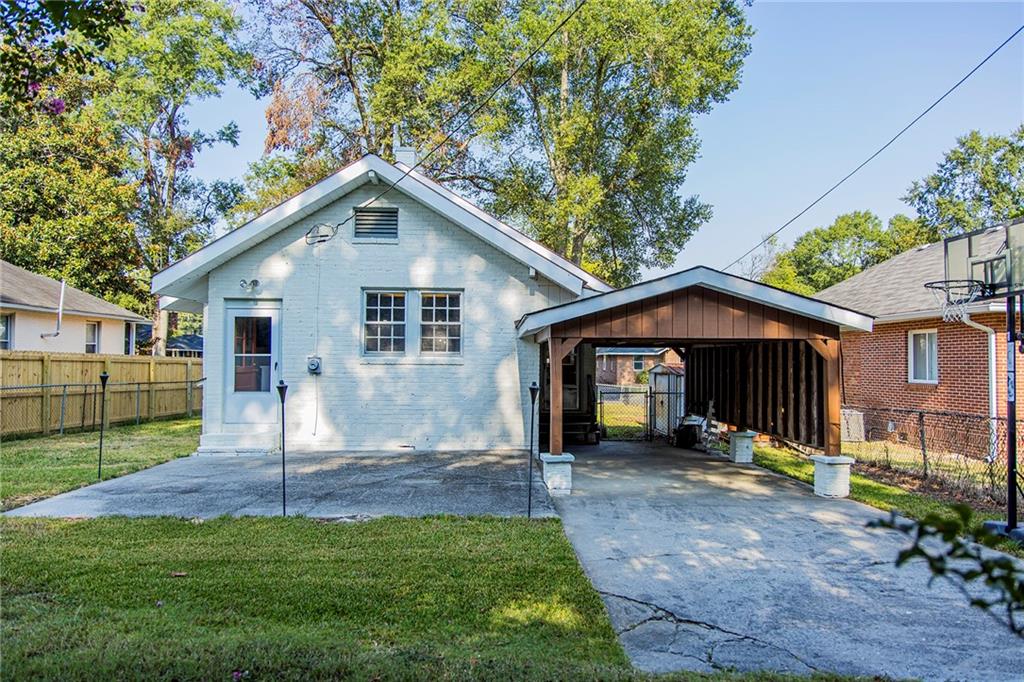 27 Oak Street Northeast Rome, GA 30161 - Photo 5 of 27 a view of a house with a yard