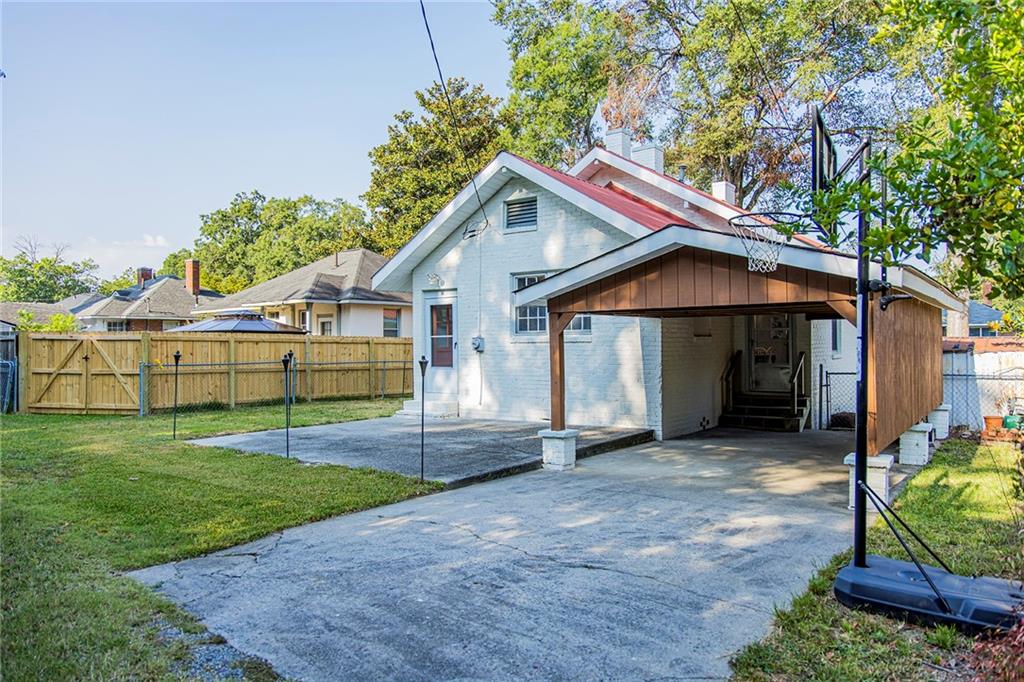 27 Oak Street Northeast Rome, GA 30161 - Photo 6 of 27 a view of a house with a yard and large tree