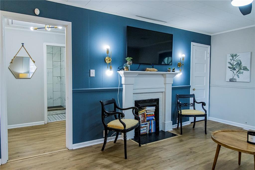 27 Oak Street Northeast Rome, GA 30161 - Photo 10 of 27 a living room with furniture and a fireplace