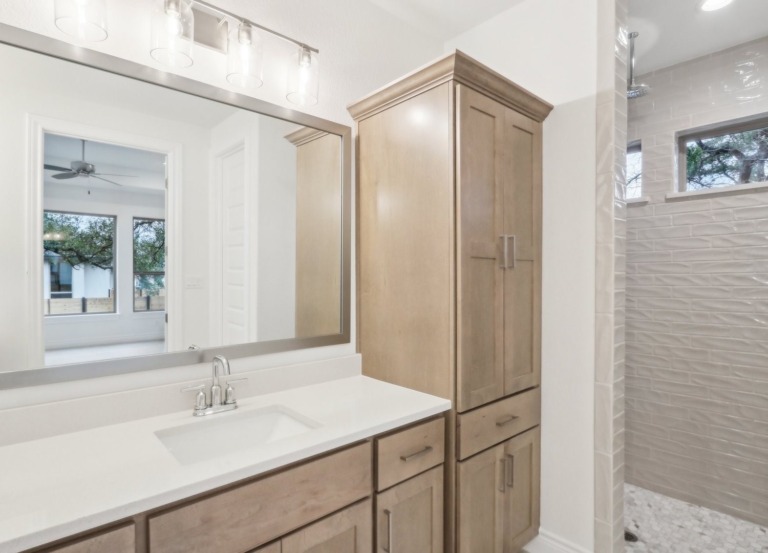 1129 Stonehill Drive Georgetown, TX 78633 - Photo 15 of 26 a bathroom with a sink and a mirror