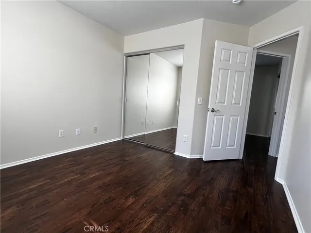 wooden floor in a hall with an entryway