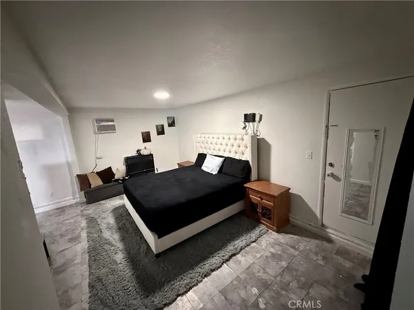 a living room with a couch and a table