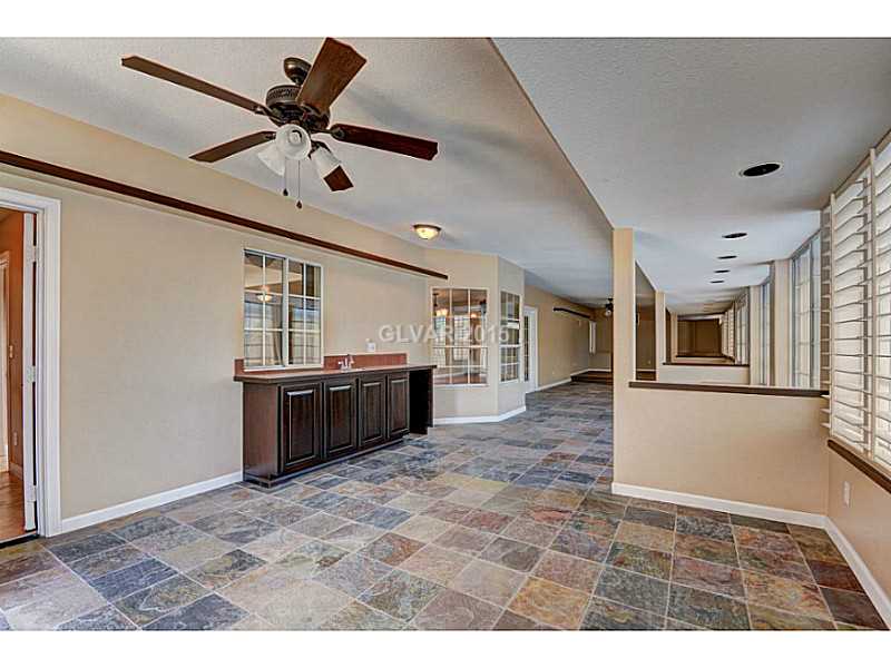 416 Blackridge Road Henderson, NV 89015 - Photo 15 of 35 Property Photo. Sun room with Bar.