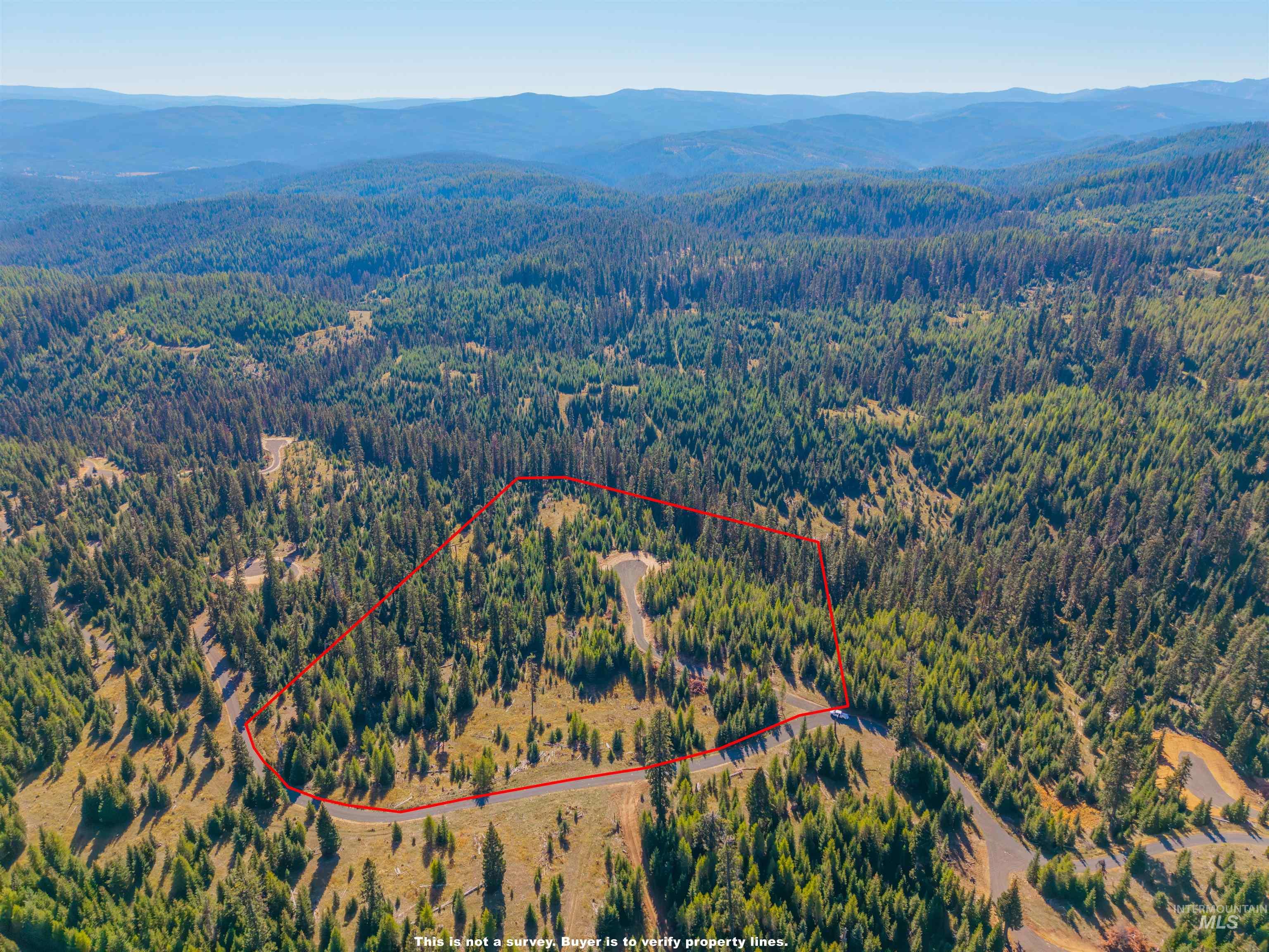 3 Tree Farm Trails Road Elk City, ID 83525 - Photo 4 of 17 Aerial view of property's location with a mountainous background and property parcel outlined