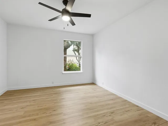 a view of small space with wooden floor