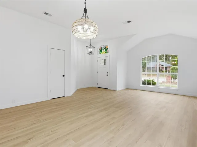 an empty room with window