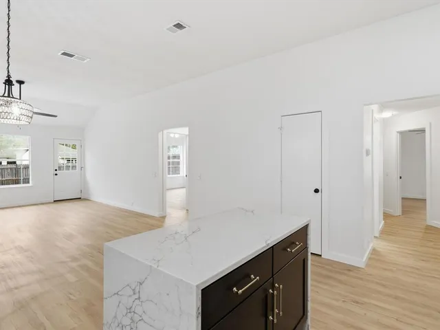 a view of a swimming pool with a backyard