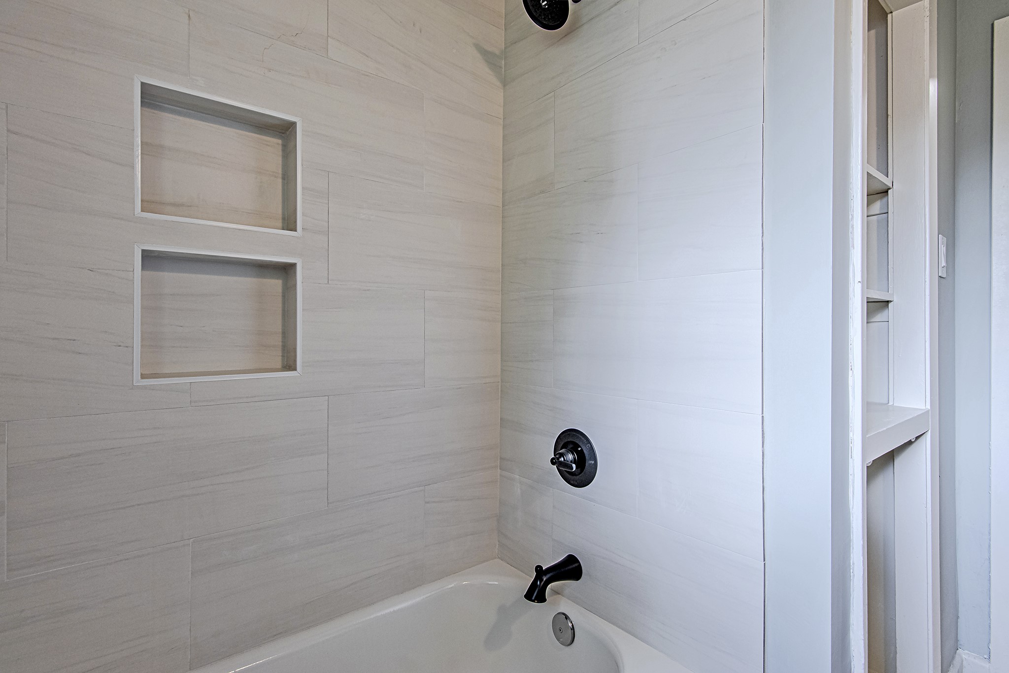 3518 Mattye Maye Drive Pasadena, TX 77503 - Photo 16 of 21 a bathroom with a bathtub