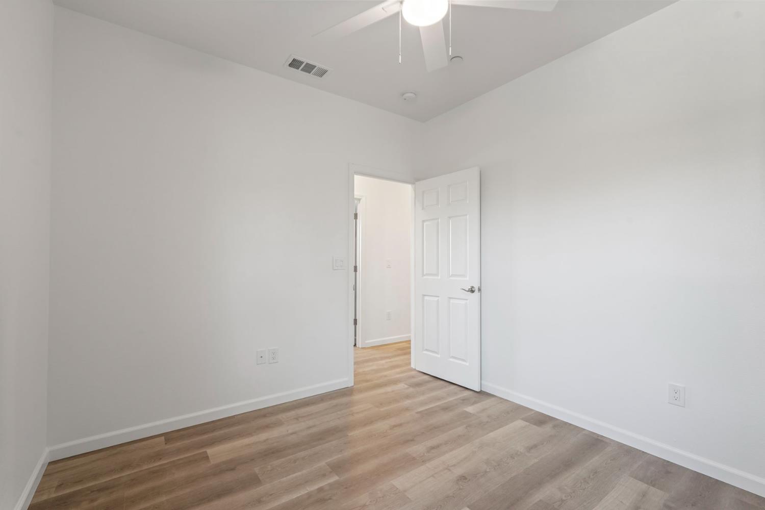 3286 Botfuher Road Valley Springs, CA 95252 - Photo 11 of 24 wooden floor in an empty room