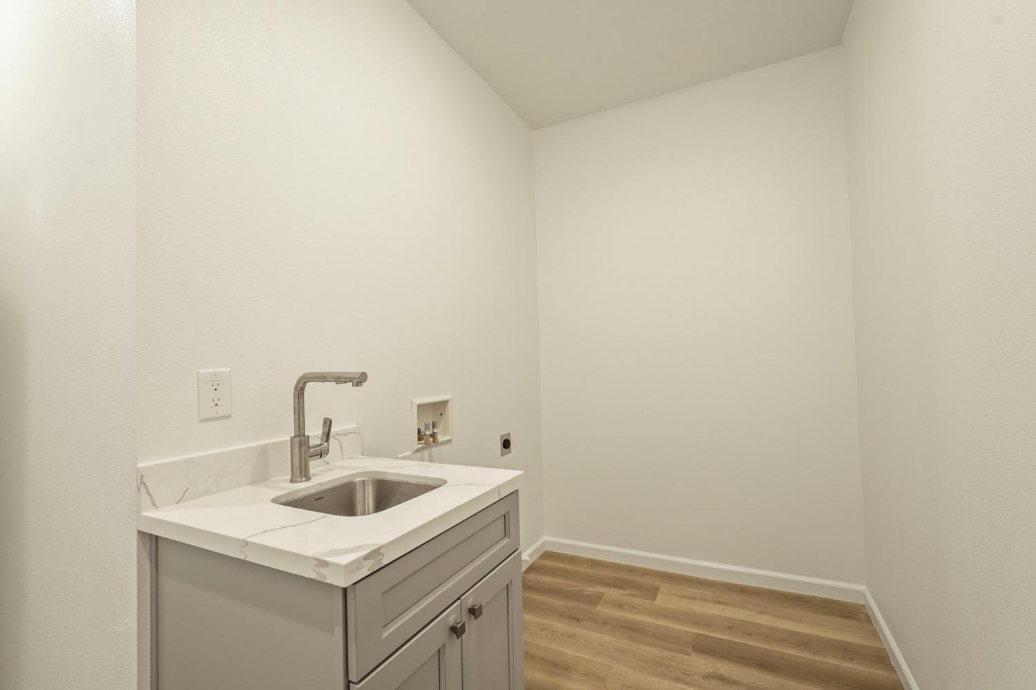 3286 Botfuher Road Valley Springs, CA 95252 - Photo 7 of 24 a bathroom with a sink and vanity