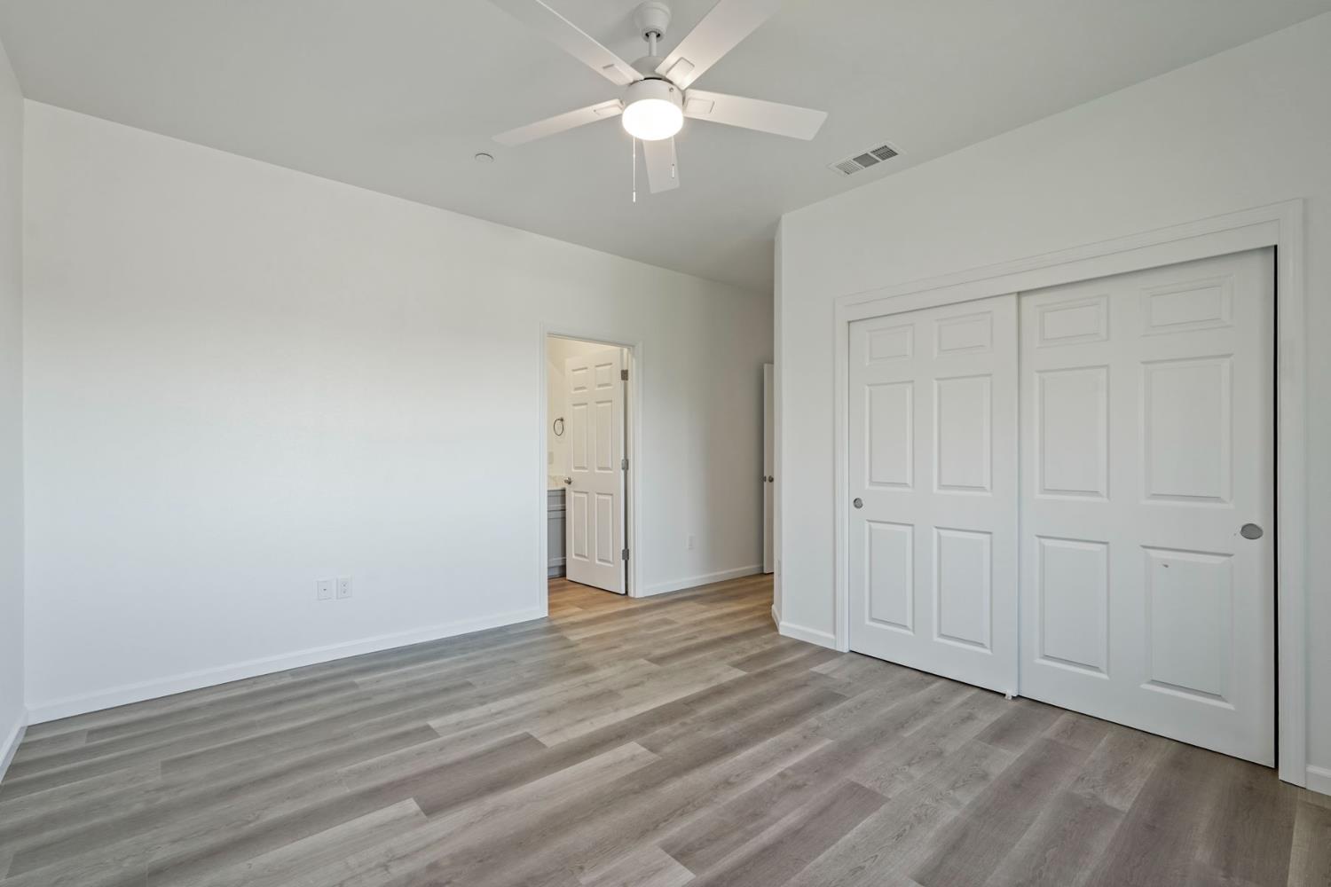 3286 Botfuher Road Valley Springs, CA 95252 - Photo 9 of 24 wooden floor in an empty room