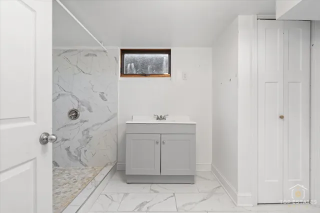 a spacious bathroom with a shower