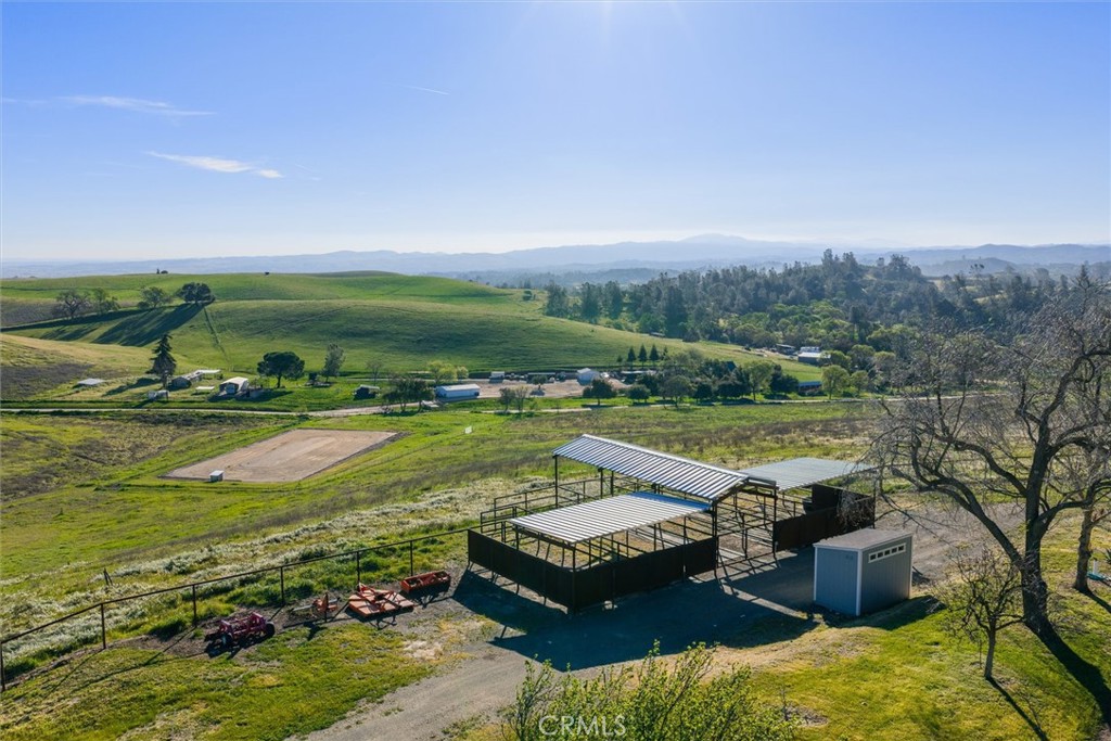 7491 Kingsbury Road Templeton, CA 93465 - Photo 30 of 53 Pipe 4 Stall Horse Barn and Arena below