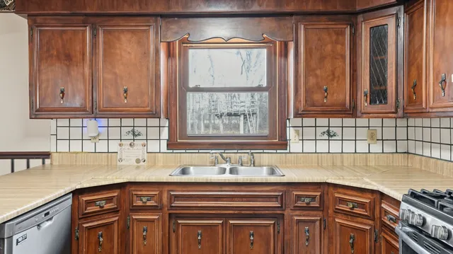 a view of a kitchen and utility room