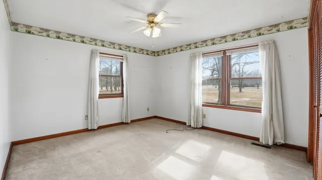 an empty room with windows