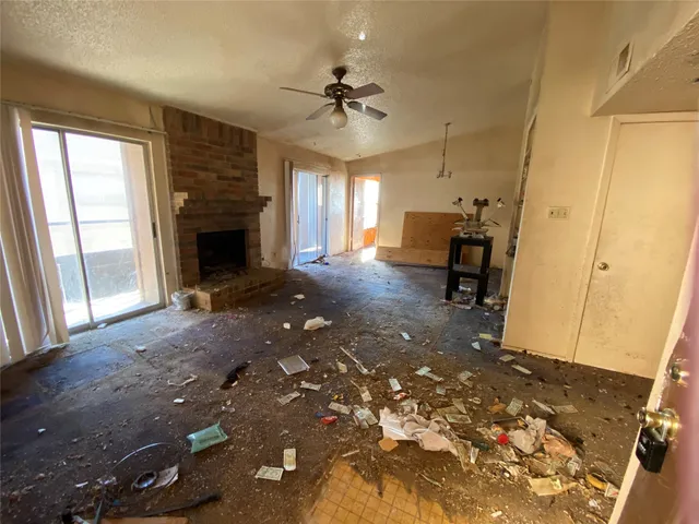 a view of a livingroom with a fireplace