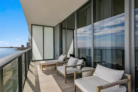 a kitchen with a sink and a refrigerator