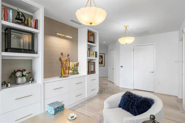 a bedroom with a bed and a chair