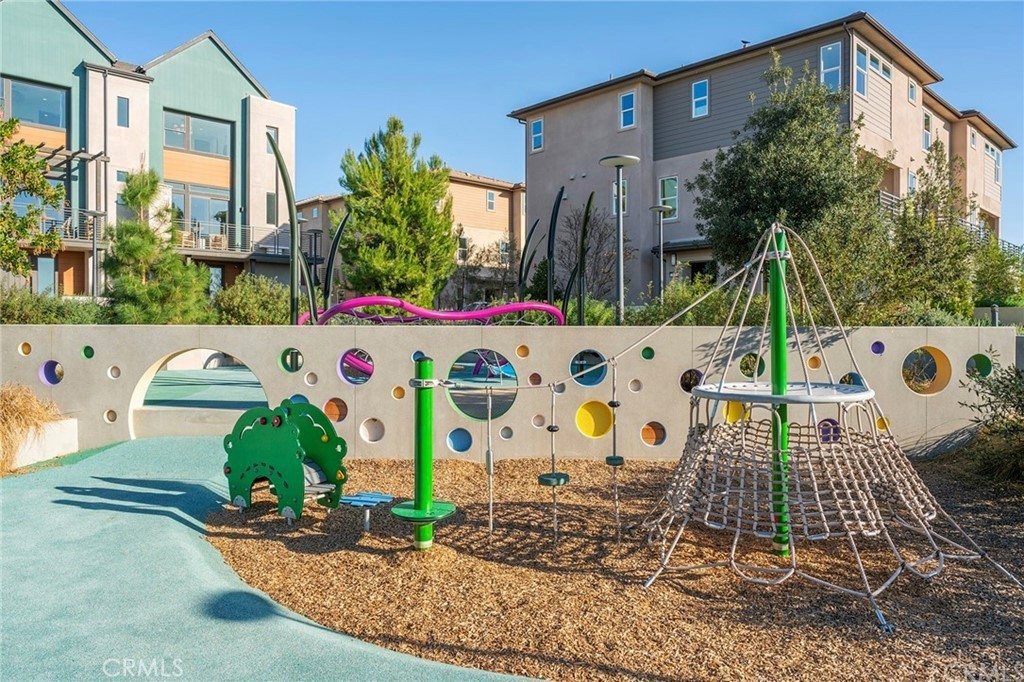 249 Chorus Irvine, CA 92618 - Photo 31 of 32 a view of a chairs and table in front of a house