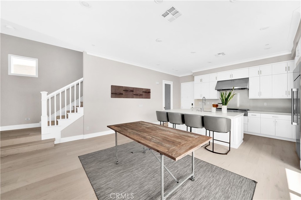 249 Chorus Irvine, CA 92618 - Photo 6 of 32 a living room with furniture and a table