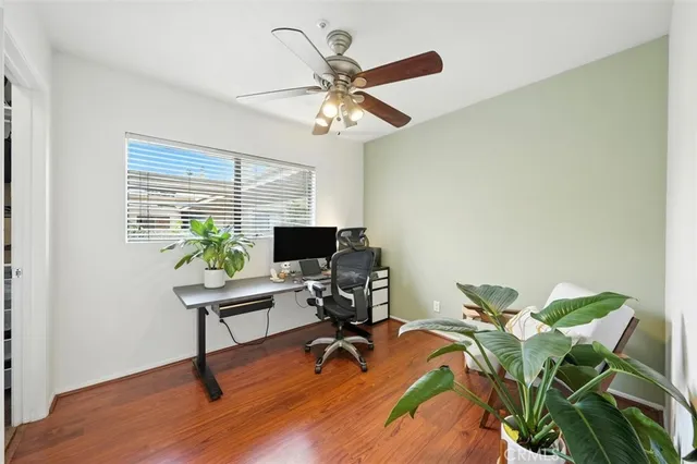 a workspace with furniture and a window