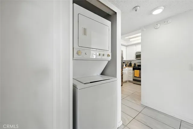 a view of a kitchen from the hallway