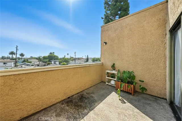 a view of balcony with furniture