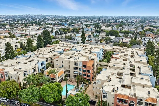 an aerial view of residential building with parking space