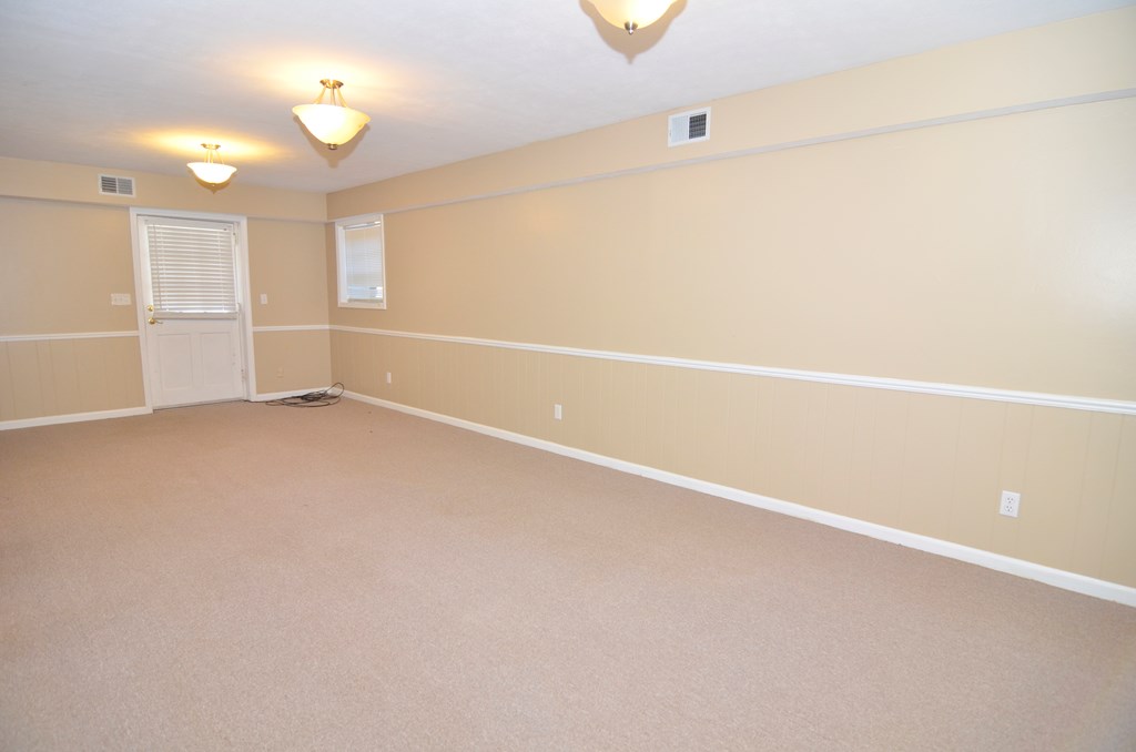 5462 Roaring Branch Road Columbus, GA 31904 - Photo 26 of 39 Basement Living Area