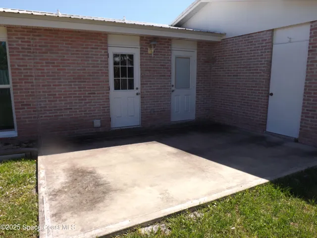 a view of backyard of house