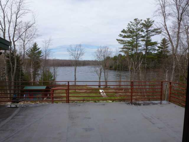 424 Main Road Milford, ME 04461 - Photo 24 of 35 Patio/Deck. Deck has a membrane...