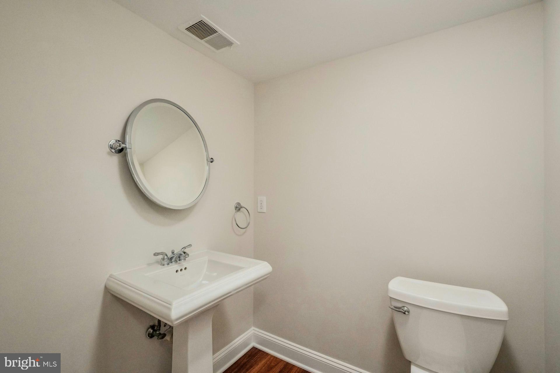 11310 Harborside Cluster Reston, VA 20191 - Photo 30 of 71 Half bath on main level.