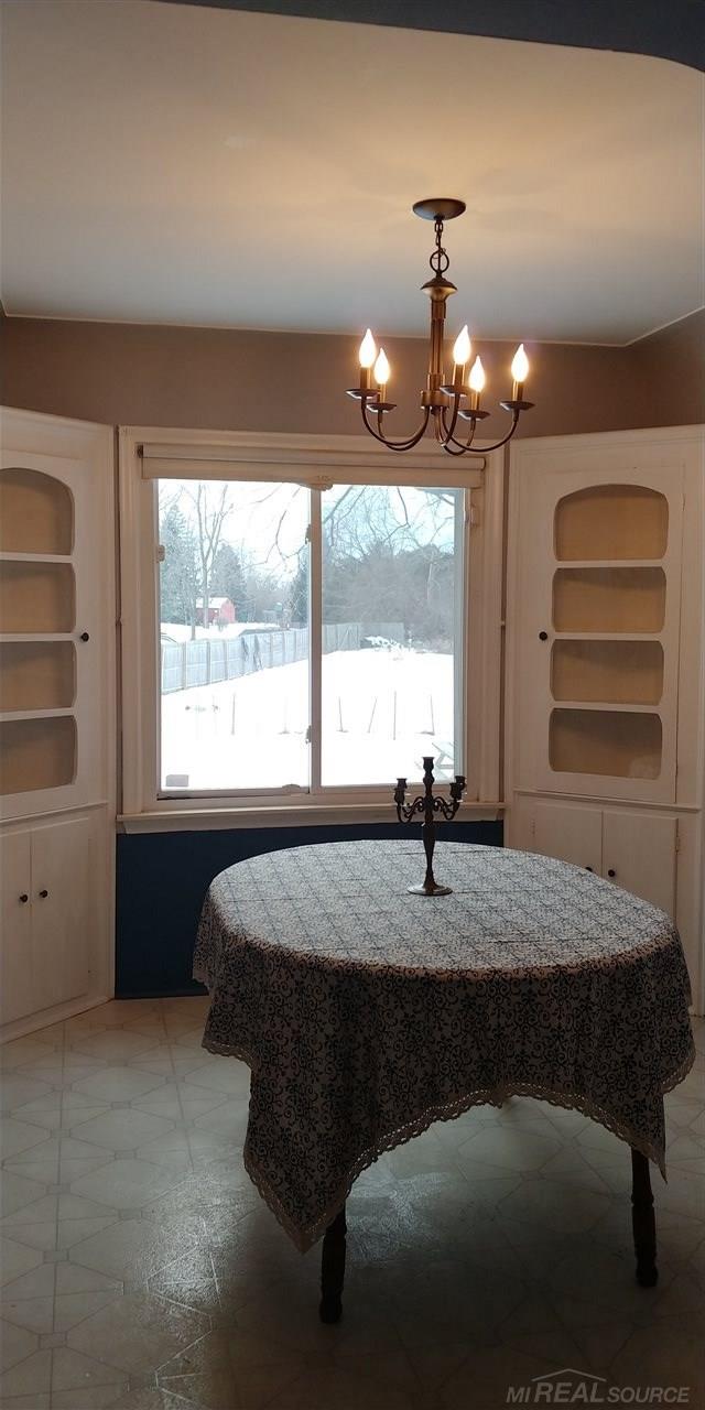 30521 Utica Road Roseville, MI 48066 - Photo 5 of 19 Original built-ins flank both sides of it's large window overlooking the property!