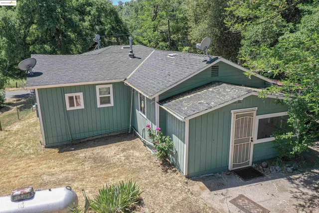 a house view with a garden space